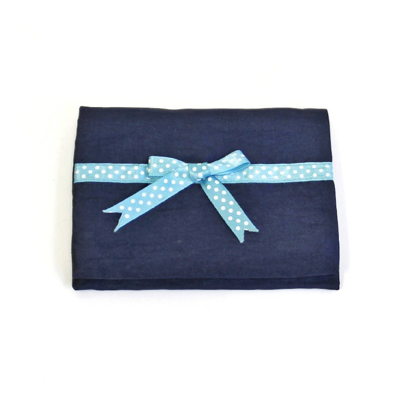 Tissue pouch with ribbon