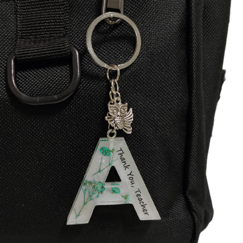 Keychain Huruf Hari Guru